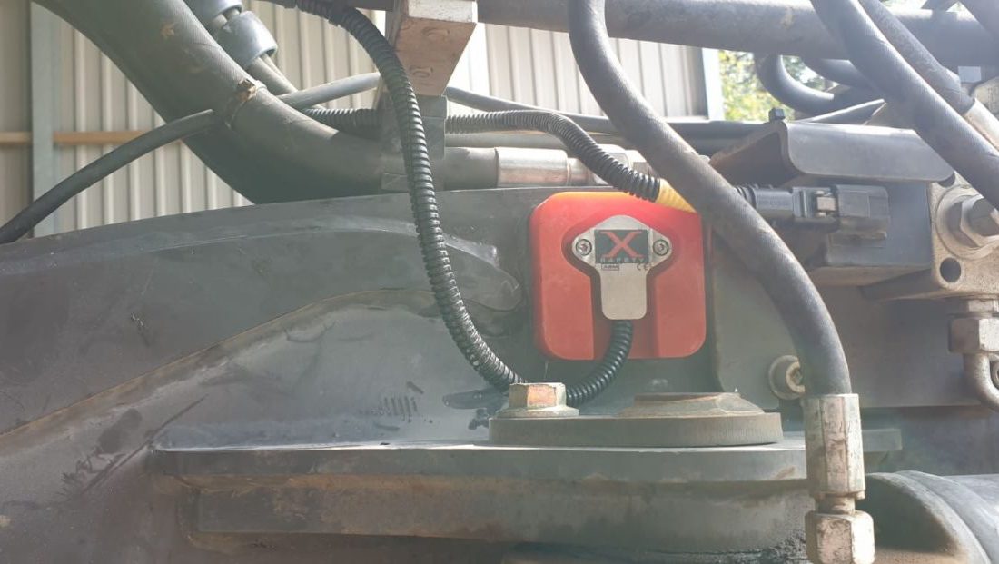 Mecalac 8MCR fitted with an Xwatch SS1 height limiter for DA Bishop .