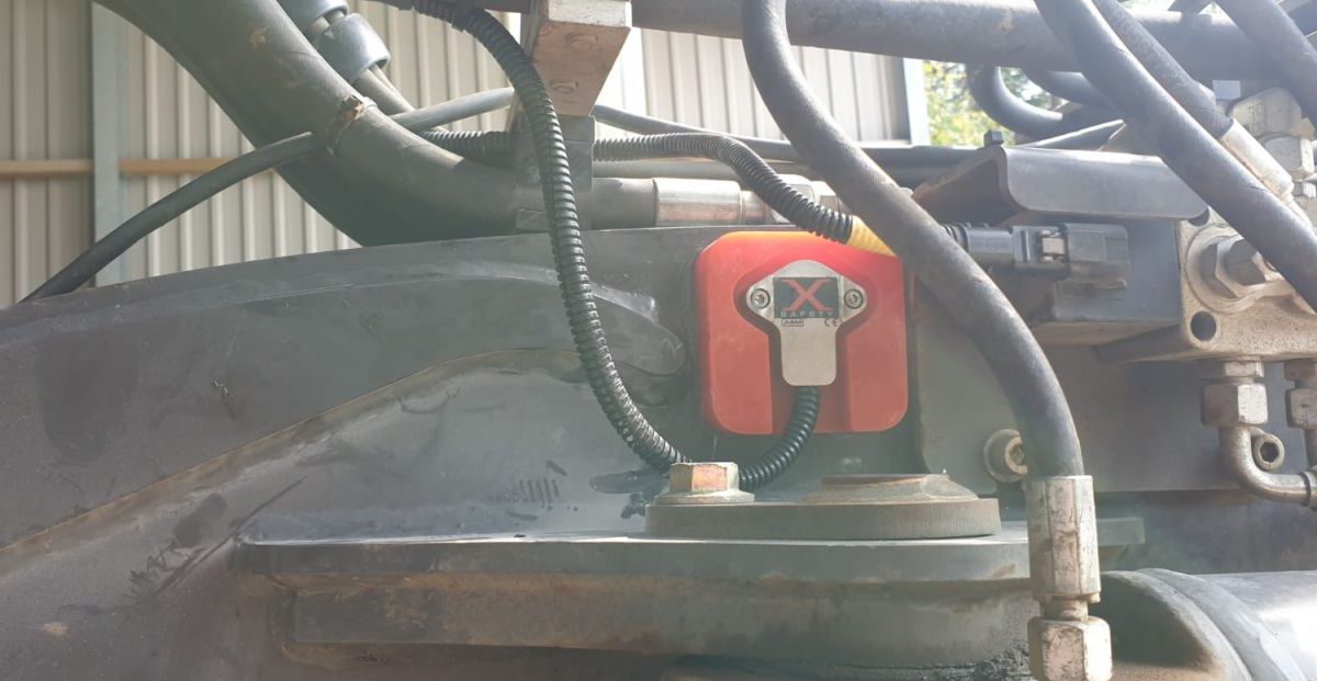 Mecalac 8MCR fitted with an Xwatch SS1 height limiter for DA Bishop .