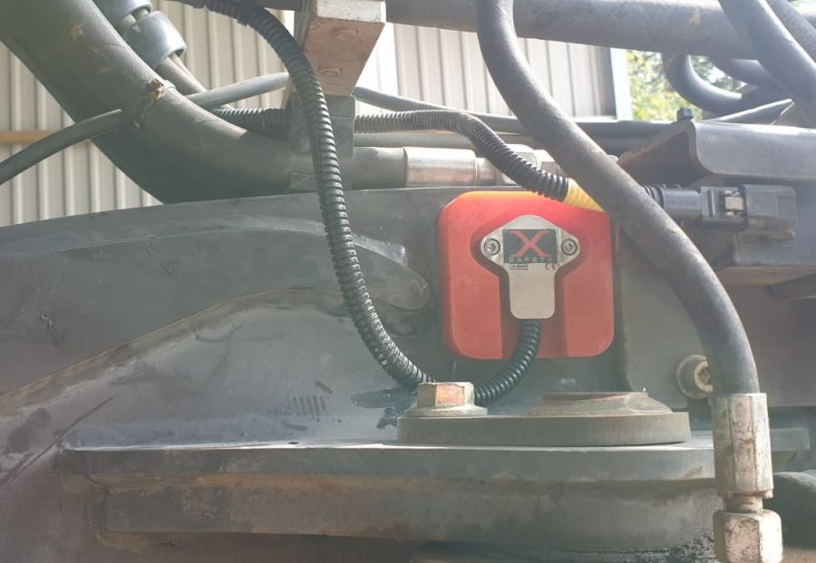 Mecalac 8MCR fitted with an Xwatch SS1 height limiter for DA Bishop .