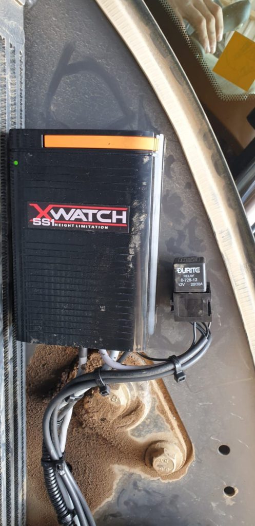 Mecalac 8MCR fitted with an Xwatch SS1 height limiter for DA Bishop .