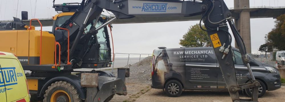 Humber Bridge as a backdrop for this Xwatch XW2 rated capacity indicator c/ w height limit on a Volvo EWR150e with TAB boom.