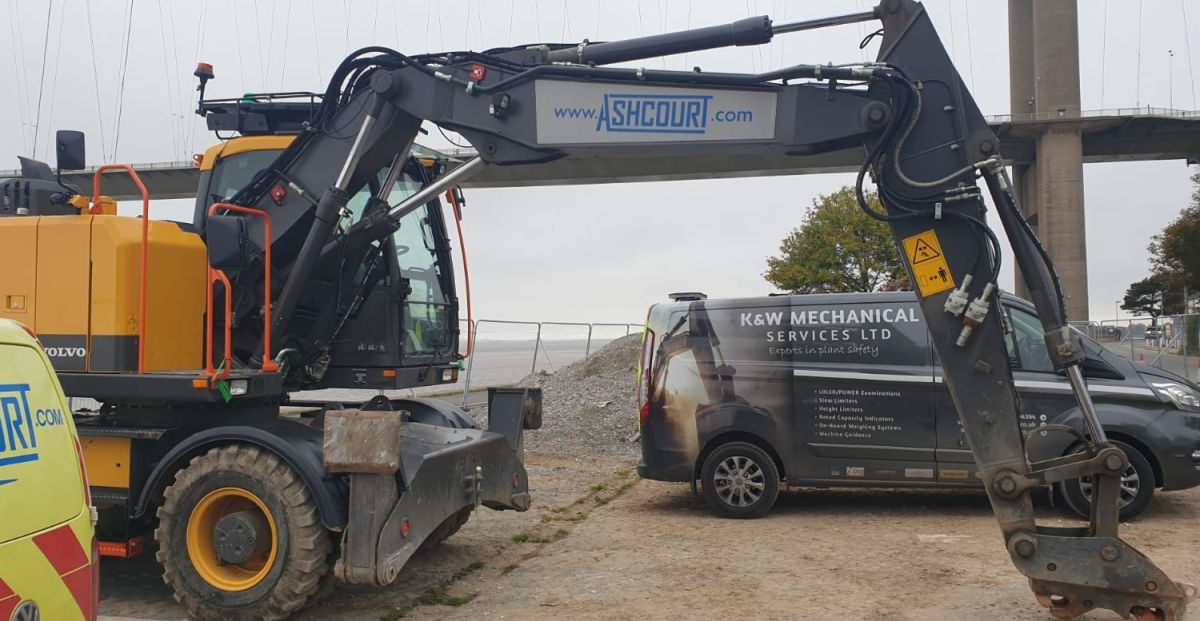 Humber Bridge as a backdrop for this Xwatch XW2 rated capacity indicator c/ w height limit on a Volvo EWR150e with TAB boom.