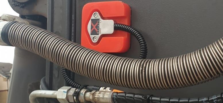 Humber Bridge as a backdrop for this Xwatch XW2 rated capacity indicator c/ w height limit on a Volvo EWR150e with TAB boom.