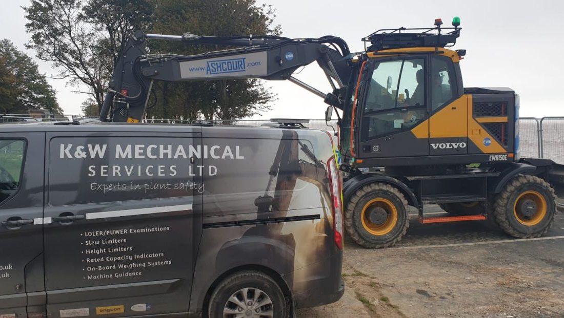 Humber Bridge as a backdrop for this Xwatch XW2 rated capacity indicator c/ w height limit on a Volvo EWR150e with TAB boom.