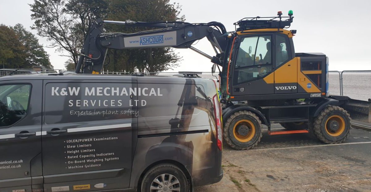 Humber Bridge as a backdrop for this Xwatch XW2 rated capacity indicator c/ w height limit on a Volvo EWR150e with TAB boom.