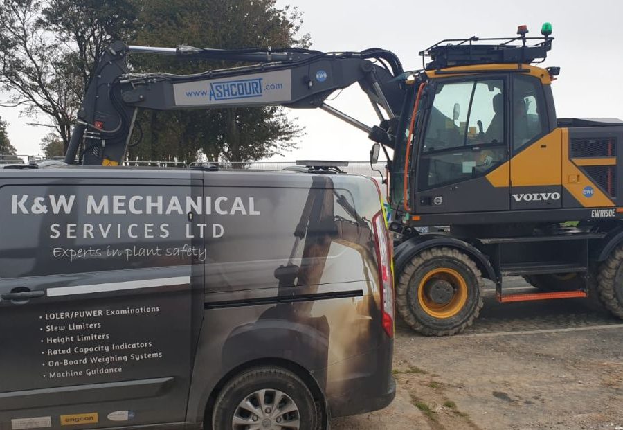 Humber Bridge as a backdrop for this Xwatch XW2 rated capacity indicator c/ w height limit on a Volvo EWR150e with TAB boom.