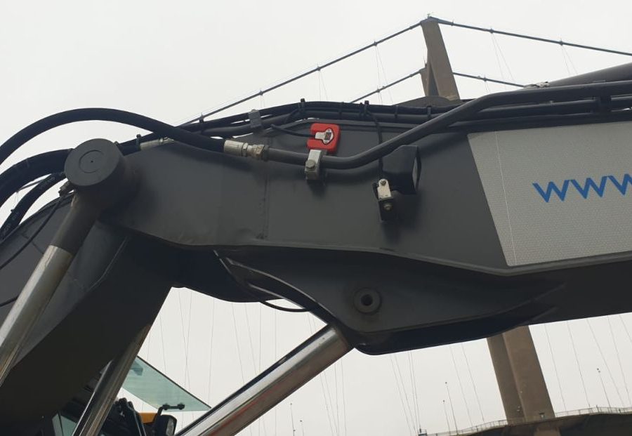 Humber Bridge as a backdrop for this Xwatch XW2 rated capacity indicator c/ w height limit on a Volvo EWR150e with TAB boom.